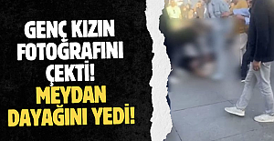 Genç kızın fotoğrafını çekti! Meydan dayağını yedi!