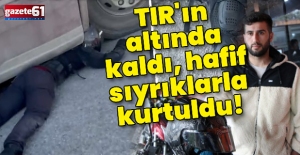 TIR'ın altında kaldı, kazayı hafif sıyrıklarla atlattı!